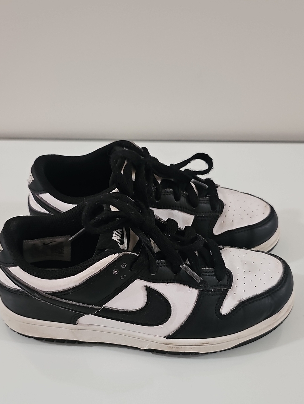 Youth Nike Black and White Low-Top Sneakers with Swoosh